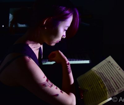 Young artist composing music