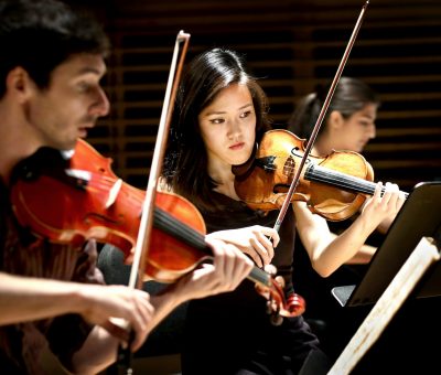 Young student artists performing at Studzinski Recital Hall