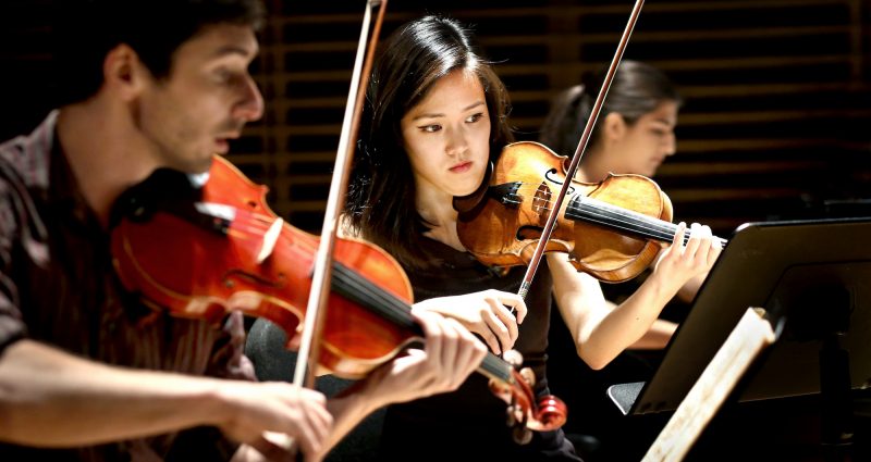 Young student artists performing at Studzinski Recital Hall