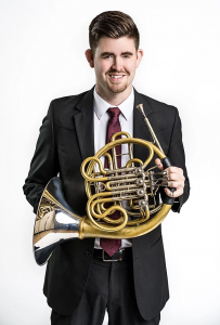 Photo of horn player Cort Roberts